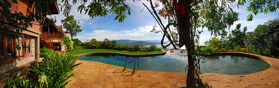 Pool and garden area in wide panorama